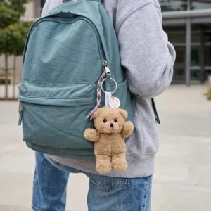 teddybear keychain on a backpack zipper