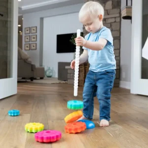 small child lifts the pole from the base, releasing the discs that were screwed on